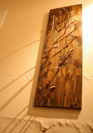 1/4" Copper Tubing in 3/4" Pine Board Image