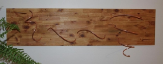1/4" Copper Tubing in 3/4" Pine Board Image